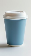 Blue paper coffee cup with white lid on white background