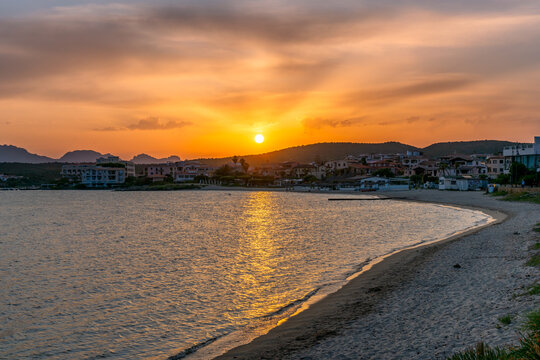 Tranquil sunset over a Sardinian beachscape, Golfo Aranci