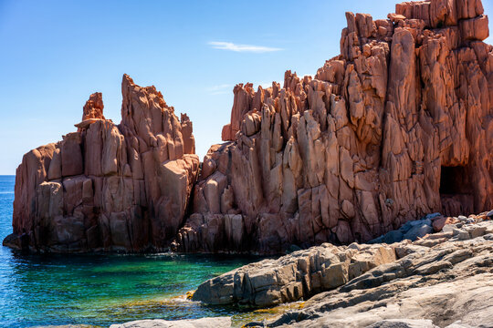 Stunning rocky coast of Sardinia with clear waters, Rocce Rosse
