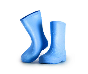 Stylish blue rubber boots with raindrops on the surface isolated on a white background