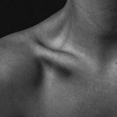 black and white woman's clavicle