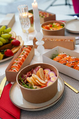 Sushi, friends and restaurant cheers with champagne for birthday celebration or social event. Celebrate toast, happy and smile of women with japanese food eating and drinking together with alcohol