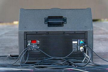 Professional sound and lighting equipment on stage. Monitor speakers for concerts and events.