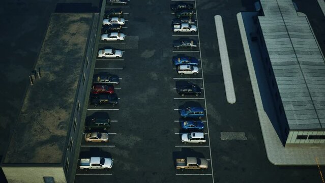 A busy parking lot packed with numerous parked cars, creating a bustling atmosphere.