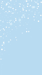 Snowy christmas background. Subtle flying snow flakes and stars on light blue winter backdrop. Delicate sweet snowy christmas. Vertical vector illustration.