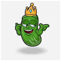 Cucumber Fruit Crown Mascot Character Cartoon With Smug expression.