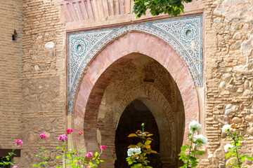 Exterior View of The Gate of Wine (Puerta del vino). Horseshoe Arch with the Beautifully Decorated Spandrels.