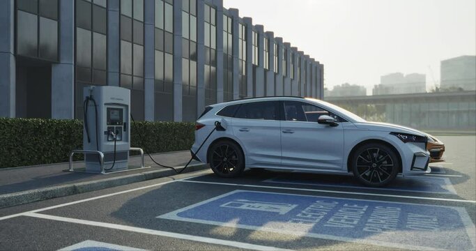 Generic electric car charging at station dock point in parking lot near shopping or office building. 3D animation of city street power hub providing eco-friendly sustainable supply for EV vehicle