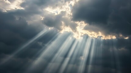 Sun rays breaking through cloud. - obrazy, fototapety, plakaty