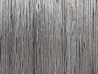 wood fence texture background. Rustic wood fence made with untreated all thin trees. Native american farm fence