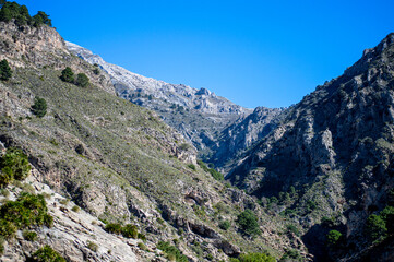 Hiking trail to Colgante bridge (Puente Colgante El Saltillo) over Almanchares river, Sierra Tejeda, Andalusia, Spain