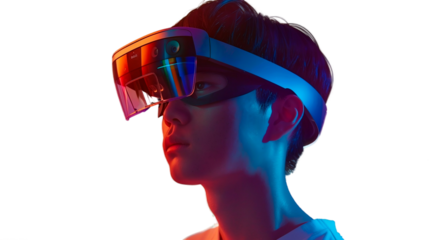 Young asian man looking in VR virtual reality goggles on the blue isolated background. Futuristic lifestyle. Theme of technology, AI, fantasy and playing people. Metaverse technology concept. 