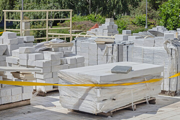 White Marble Stone Blocks at Pallets Construction Site Storage