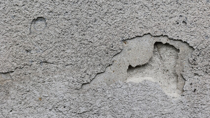 Textures of old concrete. Gray damaged concrete background, wall, old slabs. Top view, close-up.
