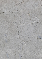 Textures of old concrete. Gray damaged concrete background, wall, old slabs. Top view, close-up.