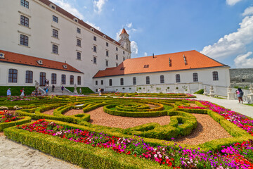 Beautiful and colorful baroque gardens being captured by tourists, Bratislava, Slovakia