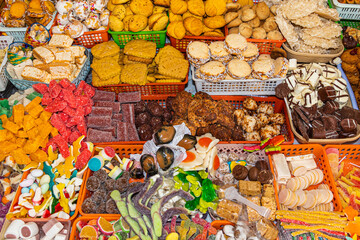 Sweets in a wide variety of flavors, shapes, colors and traditional preparation methods are displayed on numerous stands during the Catholic celebration of Corpus Christi in Cuenca, Ecuador