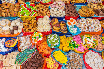 Sweets in a wide variety of flavors, shapes, colors and traditional preparation methods are...