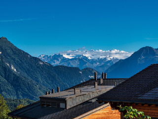 Fototapeta na wymiar Alpine Swiss Village. Comfort and tranquility.