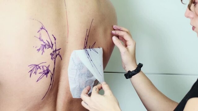 Preparing for a Bamboo Tattoo on Back