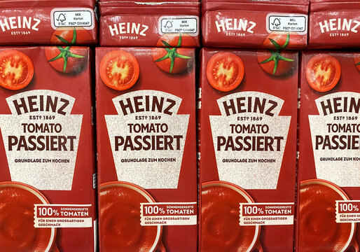 Viersen, Germany - May 9. 2024: Closeup of packs Heinz strained tomatoes puree in german store