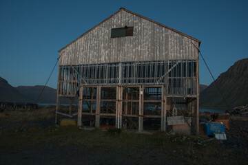 fish drying shed in village of Flateyri in the westfjords of Iceland - 795778989