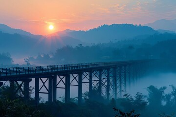 elegant bridge stretching towards sunrise among misty mountains new day hope landscape photography