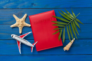Bright flat lay with travel accessories on wooden background, top view
