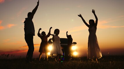 Family party in nature by car, children kids parents dancing together enjoying summer time fun...