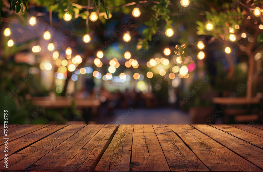 Poster Bokeh lights over an empty wooden table set for a vibrant product display backdrop