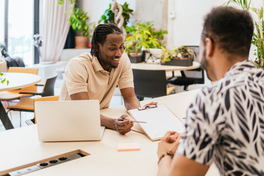 Friendly collaboration at a modern coworking space