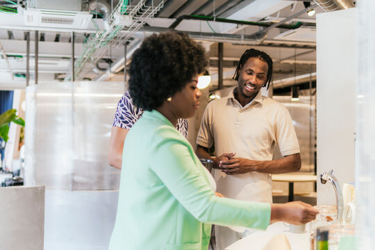 Professional interaction in a modern coworking space