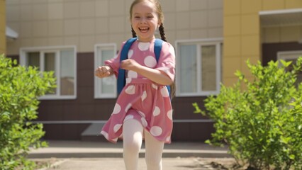 child kid girl daughter running school backpack, returning from school from lessons, children education school yard house running leg, fun with motion, elementary child fun, childhood enjoyment