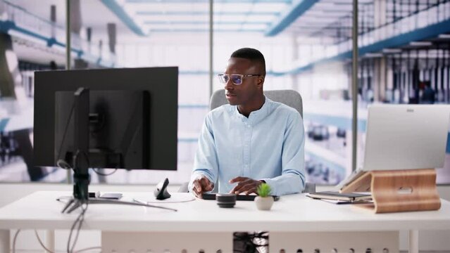 Employee Working On Desktop Computer