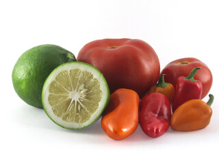 tomato, yellow pepper, green, natural lemon on white background