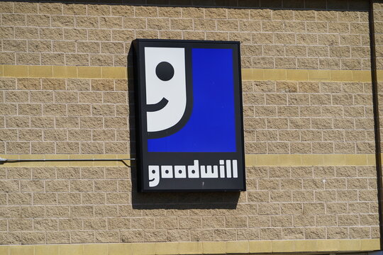 Goodwill Sign and logo on the side of the store building
