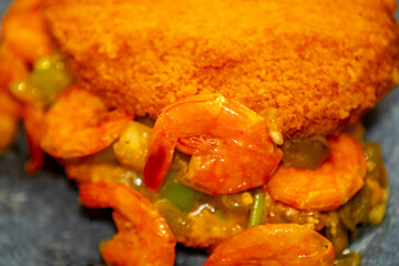 Traditional Brazilian acarajé, food of African origin based on vatapá, caruru and dry shrimp 
