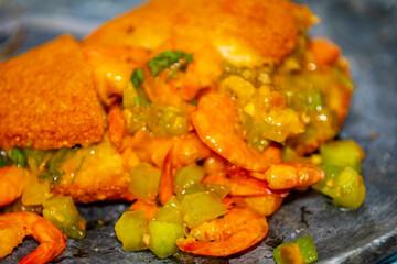 Traditional Brazilian acarajé, food of African origin based on vatapá, caruru and dry shrimp 