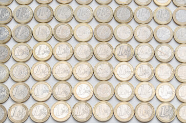 One euro coins on white background