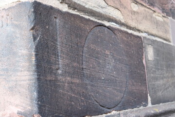 Unit of measurement marked on the cathedral wall of Freiburg Cathedral Market, Germany.