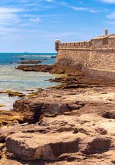 Fototapeta premium Old stone fort of San Sebastian and corner tower on a sunny day.