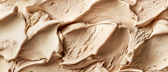 Cappuccino  flavor gelato - full frame background detail. Close up of a beige surface texture of...