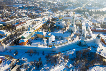 Aerial panoramic view of Holy Trinity St. Sergius Lavra in Sergiev Posad on sunny winter day,...