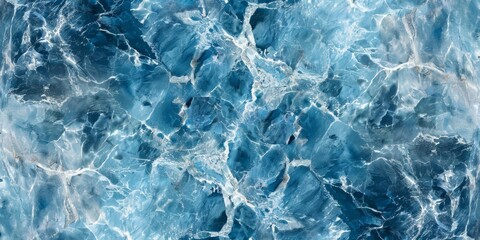 Obraz premium A blue and white marble wall with a blue ocean in the background