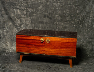 old wooden furniture on a gray background