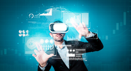 Skilled business man looking data analysis while planning strategy by using visual reality glasses. Professional smart investor checking financial graph holographic while wearing VR goggle. Deviation.