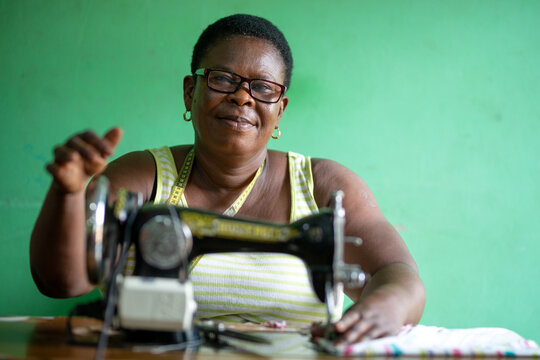 Disabled Black seamstress at work