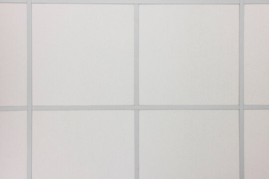 White ceiling with PVC tiles, view from below