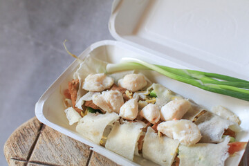 Fresh Spring rolls with crab on top and sweet sauce. Asian Food Thai style sideview. Healthy food concept.