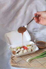 Fresh Spring rolls with crab on top and sweet sauce. Asian Food Thai style sideview. Healthy food concept.